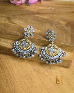 Stunning dual tone brass Kundan floral jhumka earrings from Haimee. Featuring pearl and quartz drops, these Temple jewelry-inspired earrings are perfect for festivals.