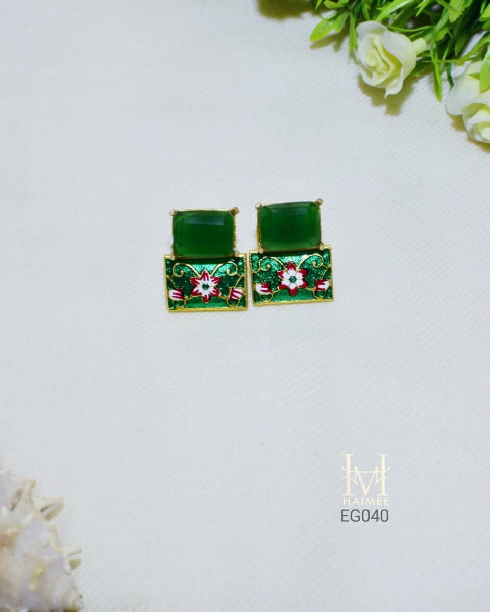 Indian artisan crafted gold plated studs with Monalisa green stones and floral Meenakari. Hand painted, perfect for adding a cultural touch to your look.