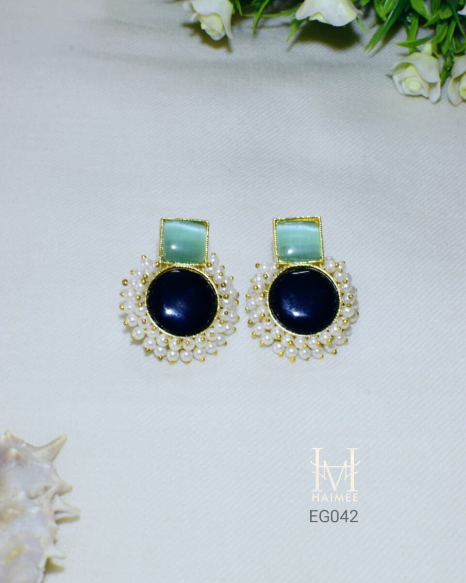 Handmade gold plated earrings with Monalisa stones and imitation pearl embellishments. Unique design, perfect for adding elegance. Shop these Indian earrings now!