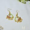 Light green gold plated peacock earrings with hand painted Meenakari and imitation pearl drops. Perfect for daily wear. Handcrafted by local artisans in India. Shop now!