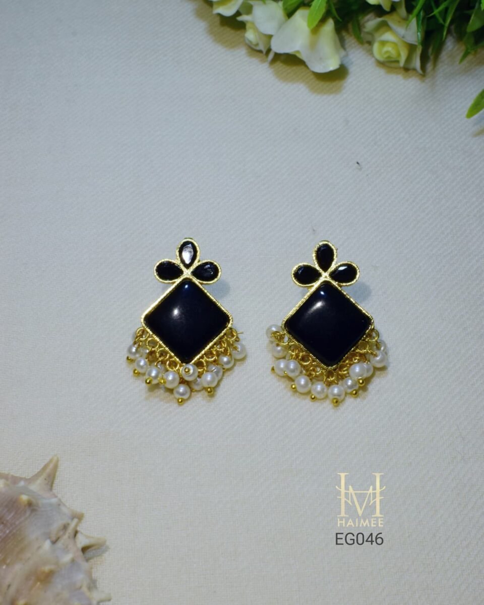 Black stone dangle earrings with a square design, gold plated setting, and seed pearl drops. Perfect for casual wear for any woman. Shop these stylish earrings now!