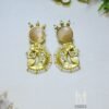 Gold plated dancing lady drop earrings with a unique stone setting and delicate seed pearl trim. Perfect for festive wear. Shop these Indian-inspired earrings now!
