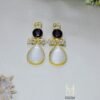 Upgrade your jewelry collection with these elegant drop earrings. Featuring captivating white and black Monalisa stones in a luxurious gold plating with pearl beads, these earrings are perfect for any special occasion.