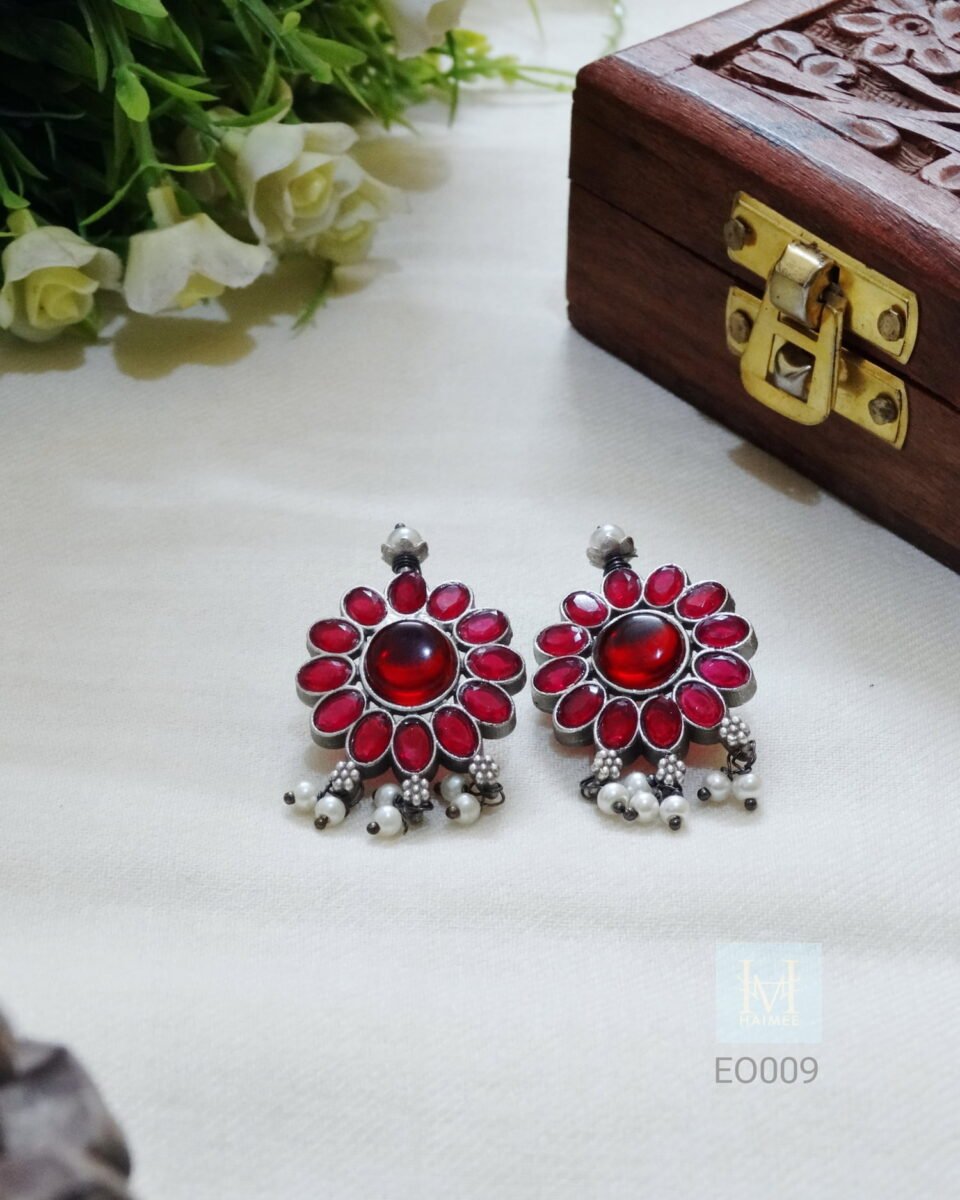 brass made silver oxydised earrings with red monalisa stone and small pearl beads