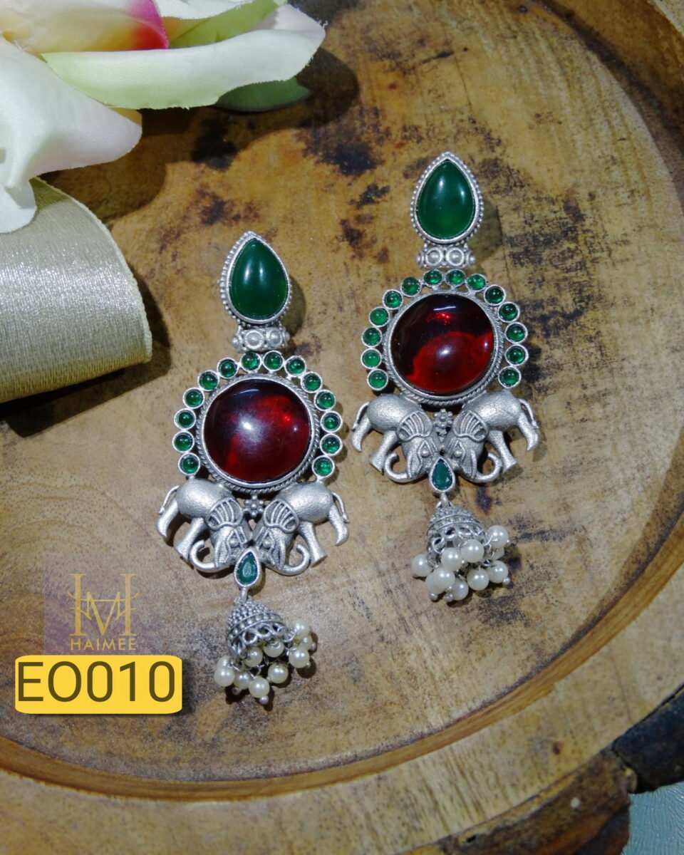 Long drop silver oxydised earrings made of brass with red green monalisa stones, with elephant motifs and pearl beads in Indian Traditional design jaipur jewellery