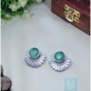 Fan-shaped oxidized silver studs with green stone centerpiece, showcasing modern Indian tribal jewellery style.