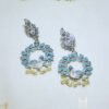 Elegant peacock motif silver oxidized earrings with small beads and blue stones. Jaipur jewellery