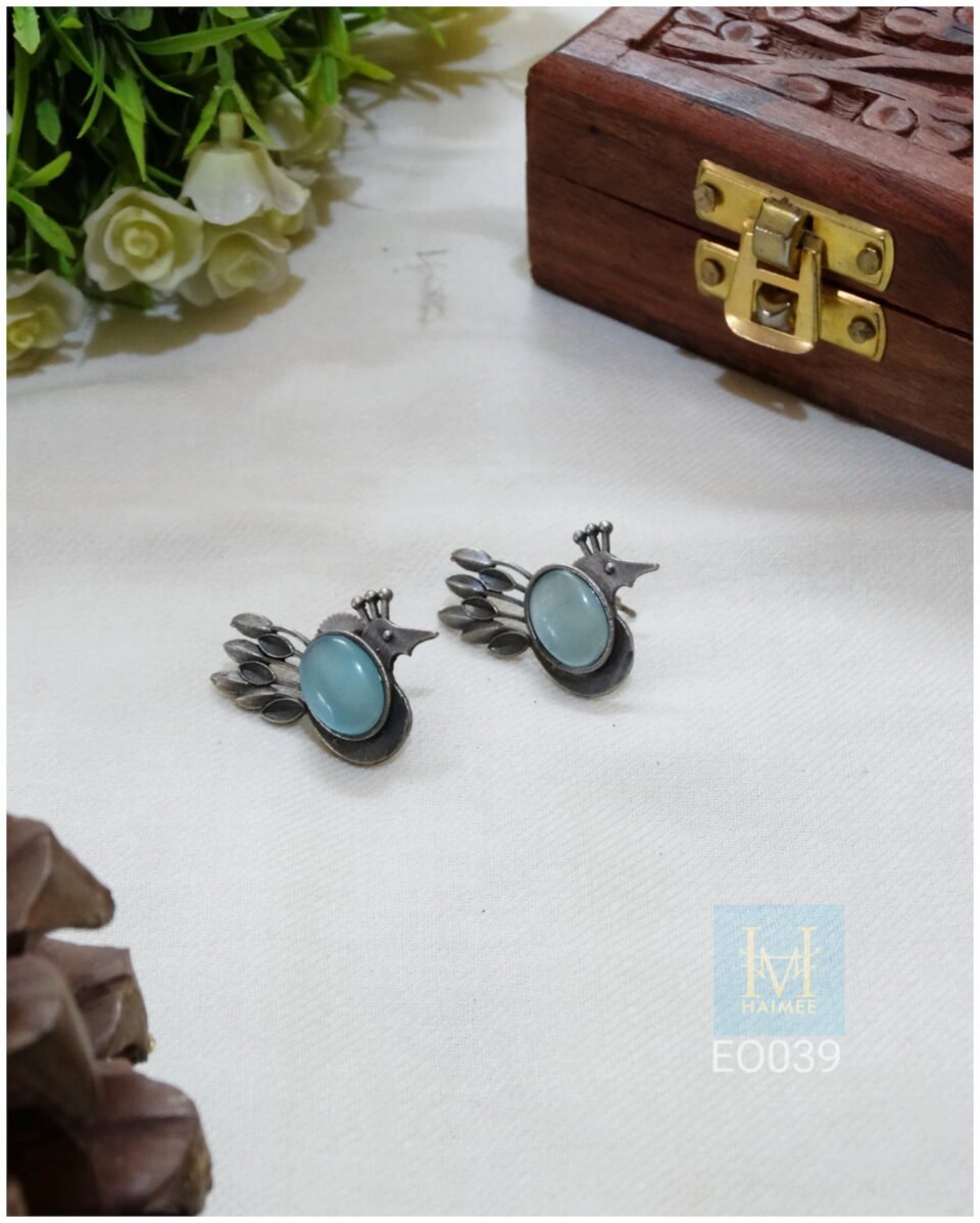 Silver oxidized brass made bird motif earrings with turquoise blue stone