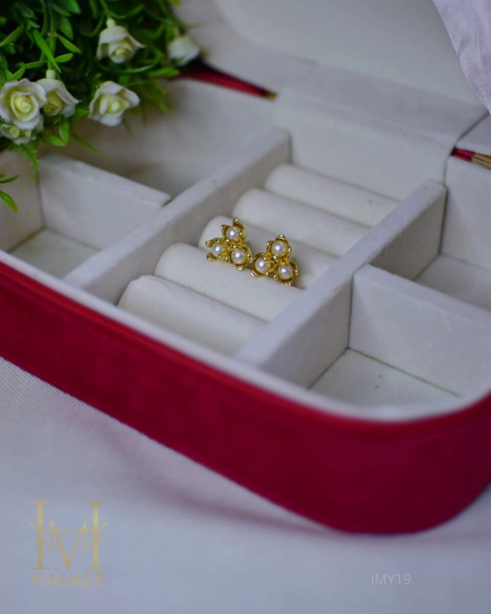 tarnish free gold plated stud earrings, each featuring a cluster of small, white faux pearls.