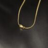 Discover this minimalist hollow spool pendant necklace from Haimee. Crafted from hypoallergenic, anti tarnish, water resistant gold plated stainless steel, it's perfect for unique everyday style