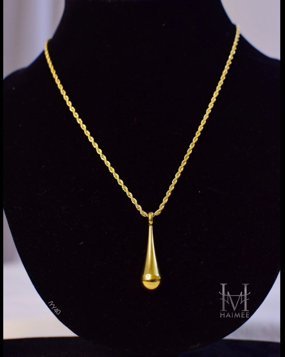 Gold plated tear drop necklace with a unique pendant design and rope chain. Hypoallergenic, anti tarnish and stylish, designed for the India market. Elevate your look with this piece.
