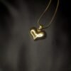 Shop solid sculptural heart necklaces from Haimee. Made from gold plated, anti tarnish, hypoallergenic stainless steel, these necklaces offer a unique everyday look.