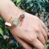 RAW STONE GOLD PLATED BRACELET ON A HAND