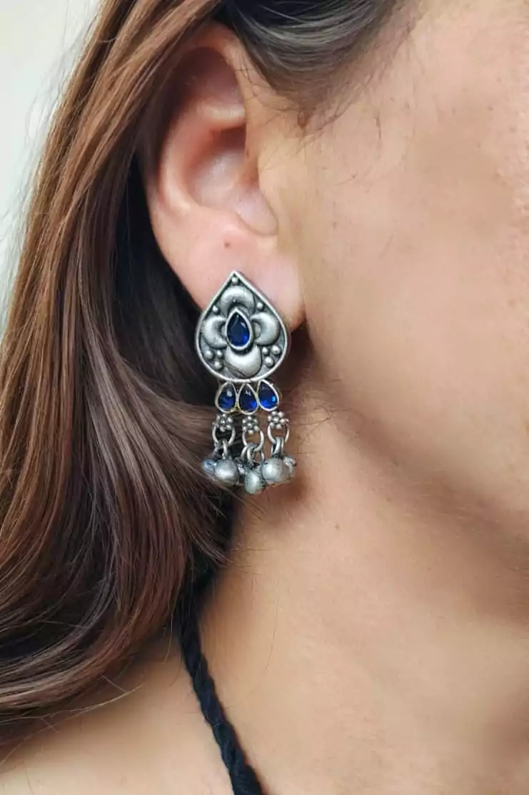 Temple jewelry style oxidised silver choker with engraved pendant, jhumka danglers, and teardrop earrings