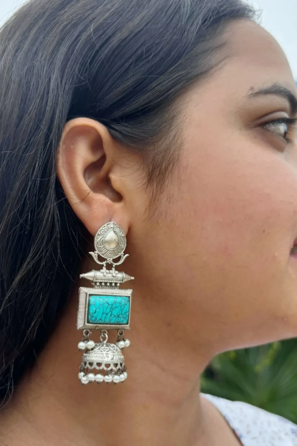 LONG EARRINGS IN EAR