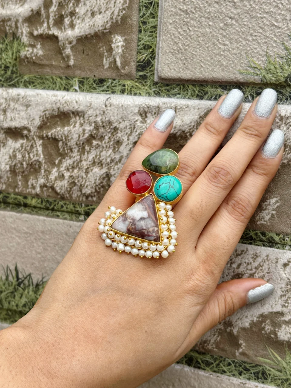 GOLD PLATED RING IN HAND